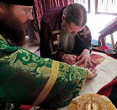 Signing the monastery's Antimins